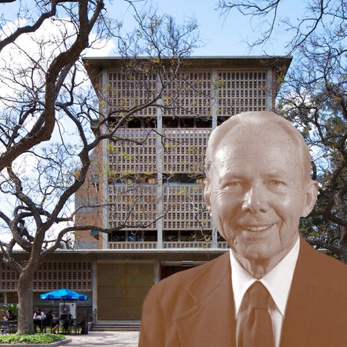 Ivan Hinderaker, the third chancellor of UC Riverside, is pictured in front of the building that bears his name and 