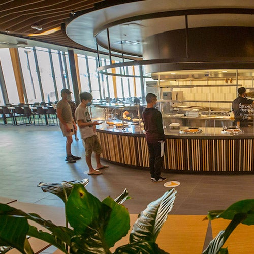 UCR students stand in line to make food selections at the Glasgow Residential Restaurant.