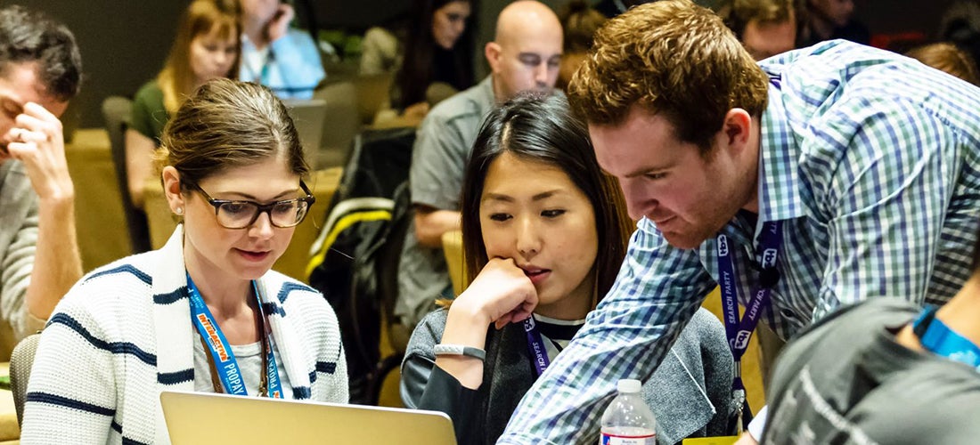 instructor helping students (c) Jon Currie