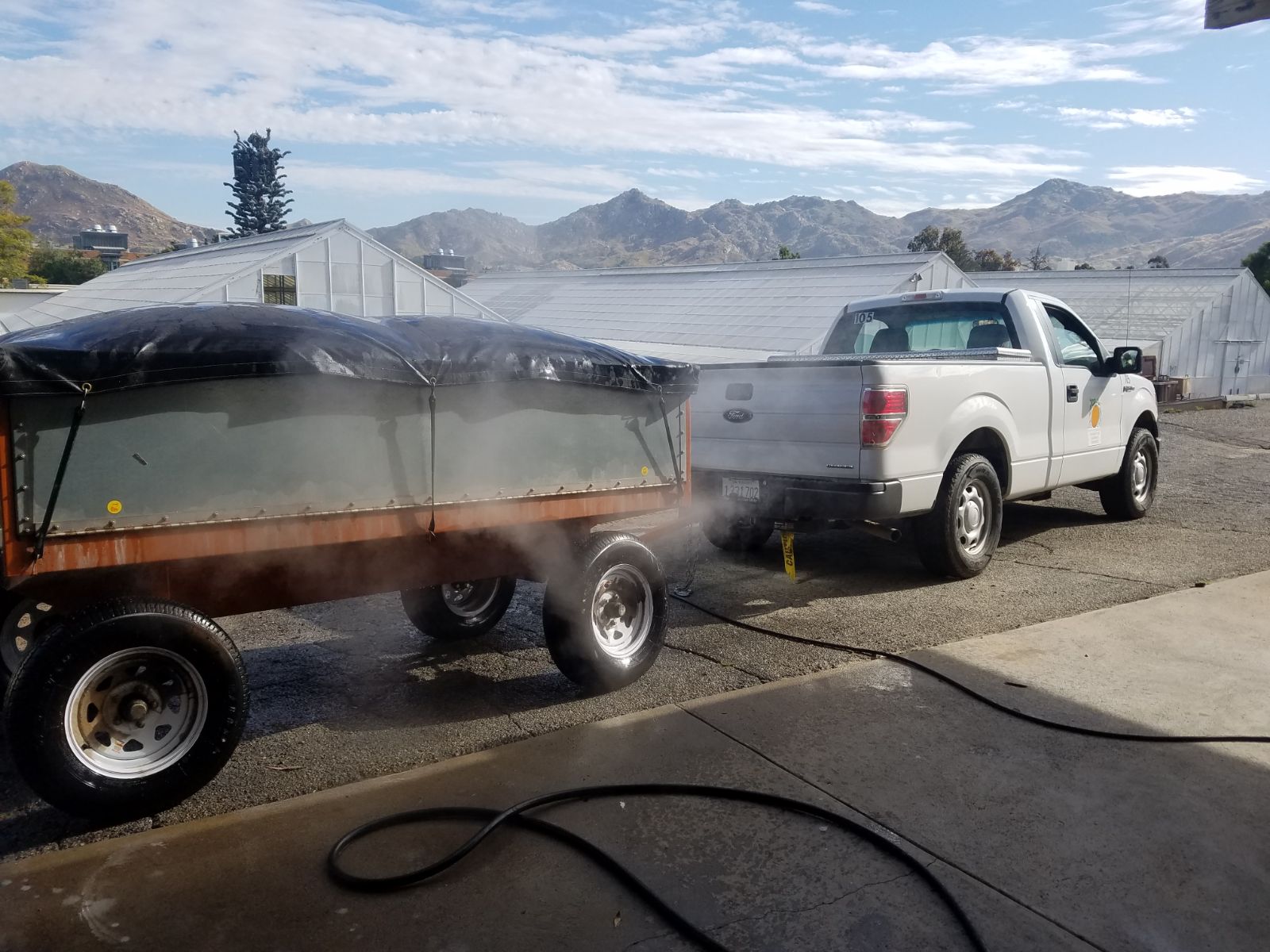 Truck with steaming soil trailer