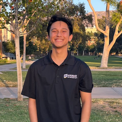 Kaleb Jones smiling and wearing an APSP polo