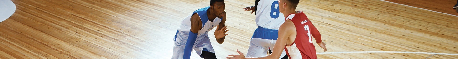 Youth playing basketball