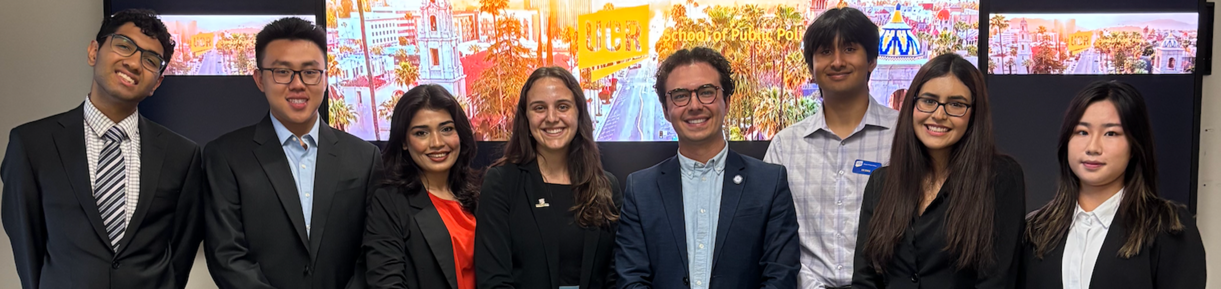 Group photo of students and Philip Falcone