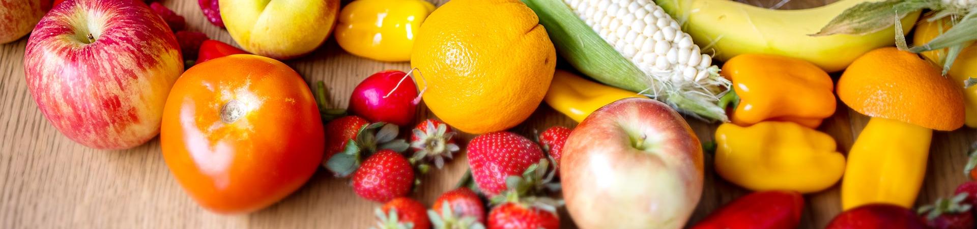 Fresh produce is laid out on table.