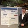 Image of Oliver with poster