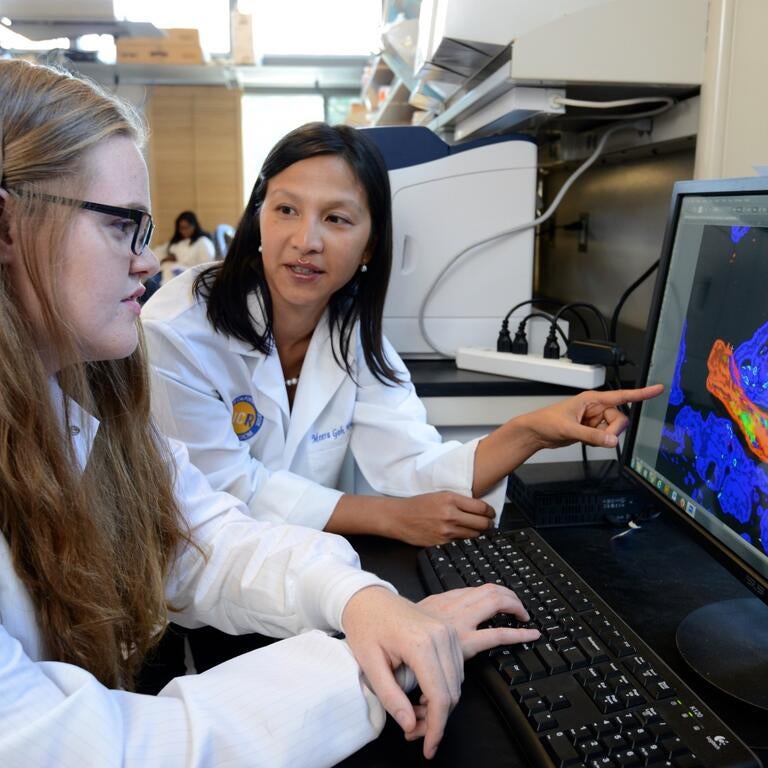 Prof. Meera Nair with graduate student