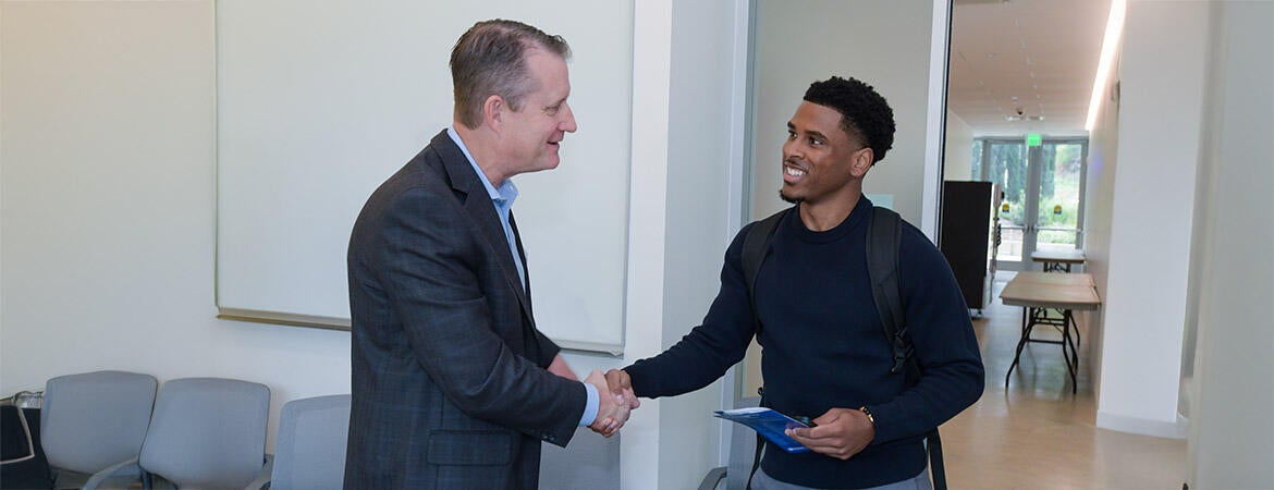 Andrew Pramschufer ’98 and Ben Gonzalez ’21 MBA led a session on Managing Up for Success