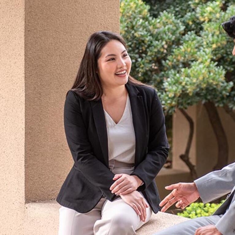 Prof. Mindy Truong with a student