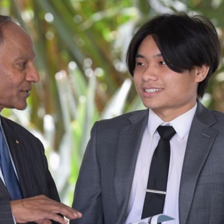 Prof. Raj Singh with two undergraduate students
