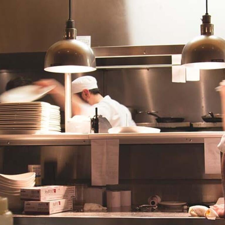 Cooks in restaurant kitchen