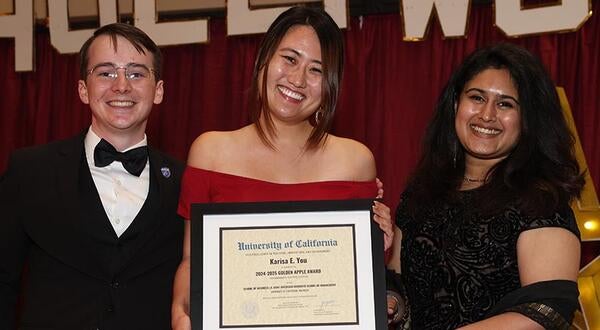Lecturer Karisa You and two students at the Faculty Teaching Awards 2025
