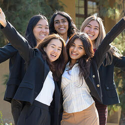 Undergraduate business students smiling