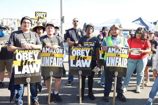 Workers and supporters strike outside the Amazon KSBD Air Hub in San Bernardino on December 21, 2024