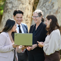Professor of Finance Jean Helwege with students