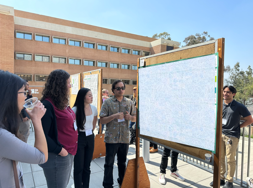 students looking at a poster