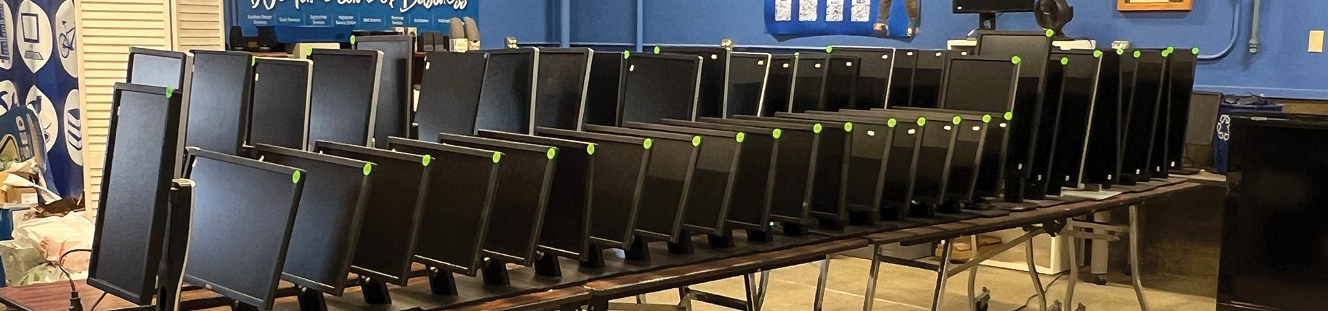 line of computer monitors