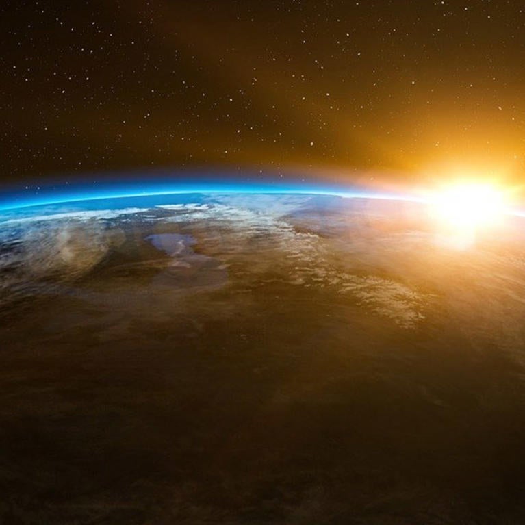 Outer space sunrise / earth