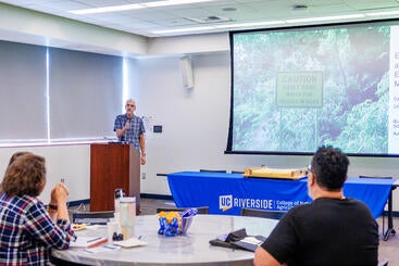 David Oglesby speaking at the RUSD Earth and Planetary Sciences Symposium.