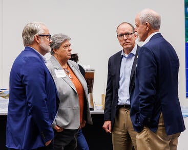 Brent Hales, Glenda Humiston, Christopher Lynch, and Peter Atkinson