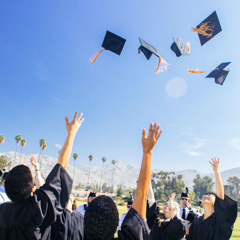graduates with caps