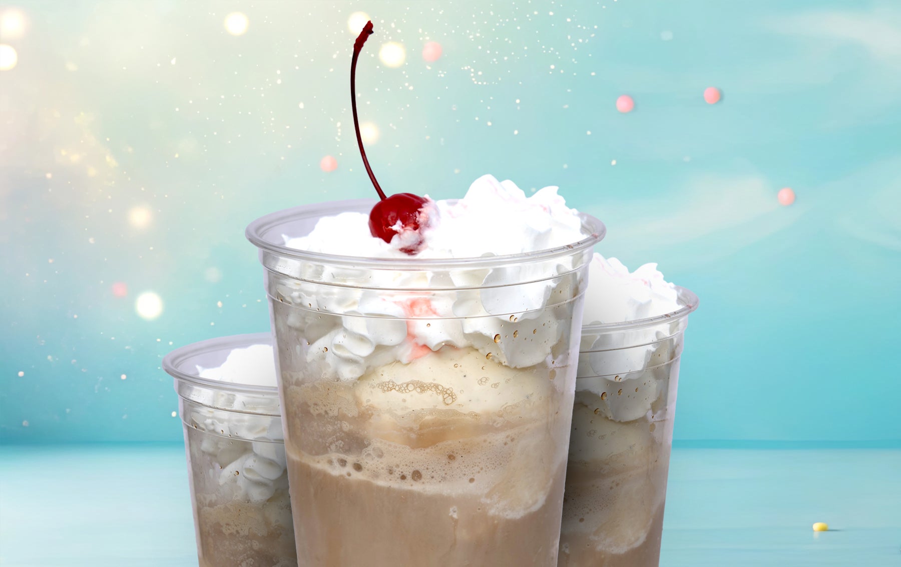 ice cream float with whip cream and cherry