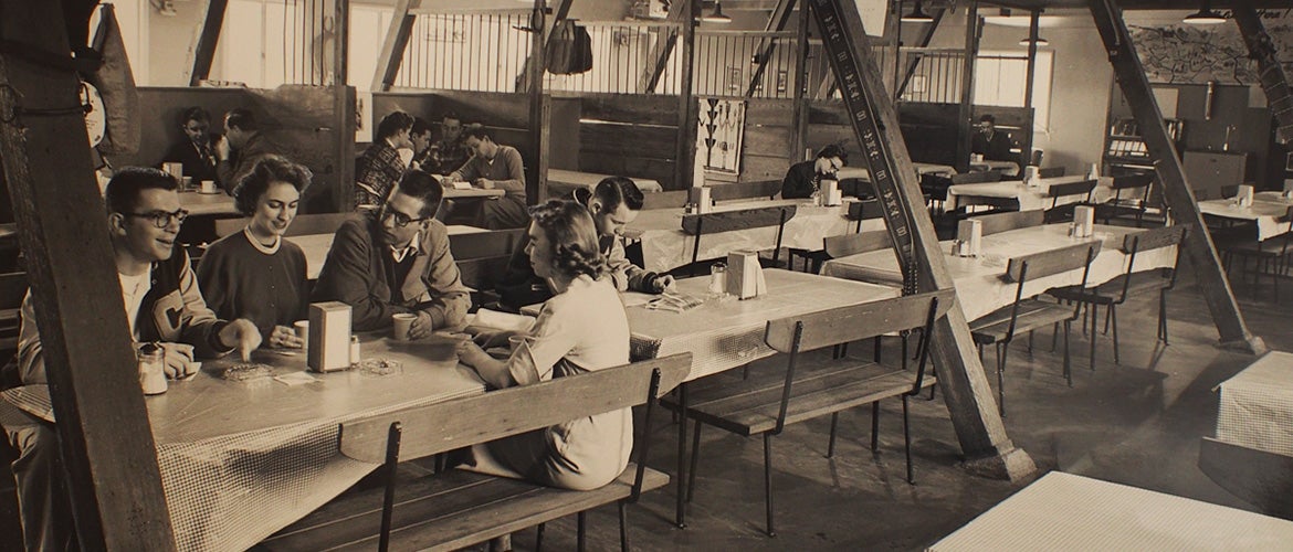 The Barn Past students eating in dining room