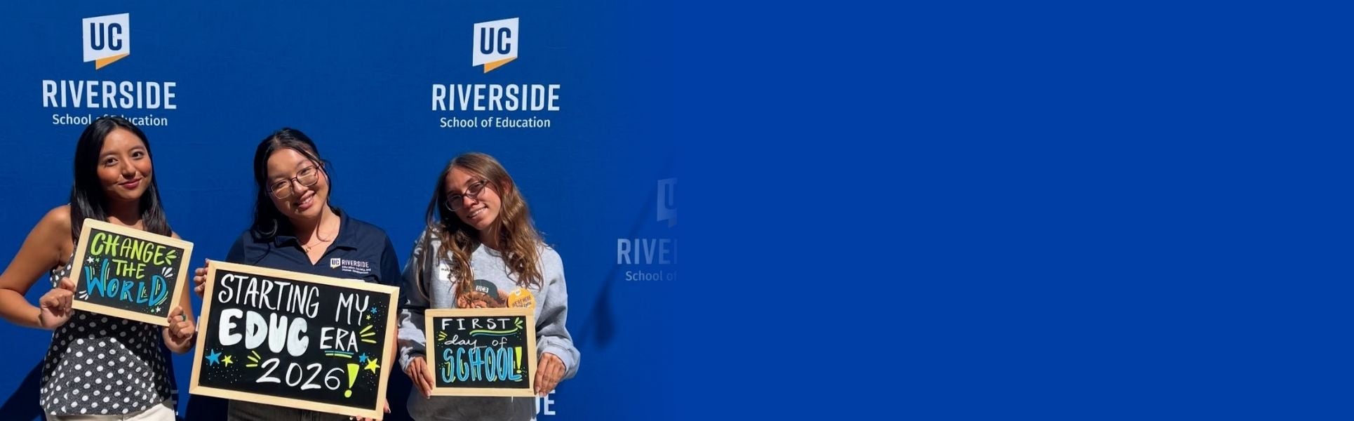 SOE students holding welcome signs