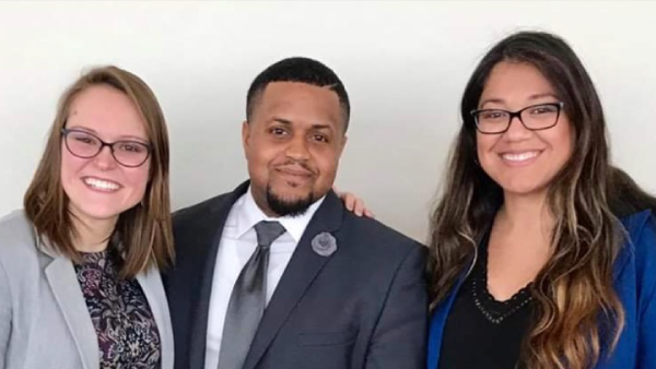 Kenyon Lee Whitman and colleagues presenting "Its Takes a Village: Family Privilege and Its Impact on College-Going Foster Youth”