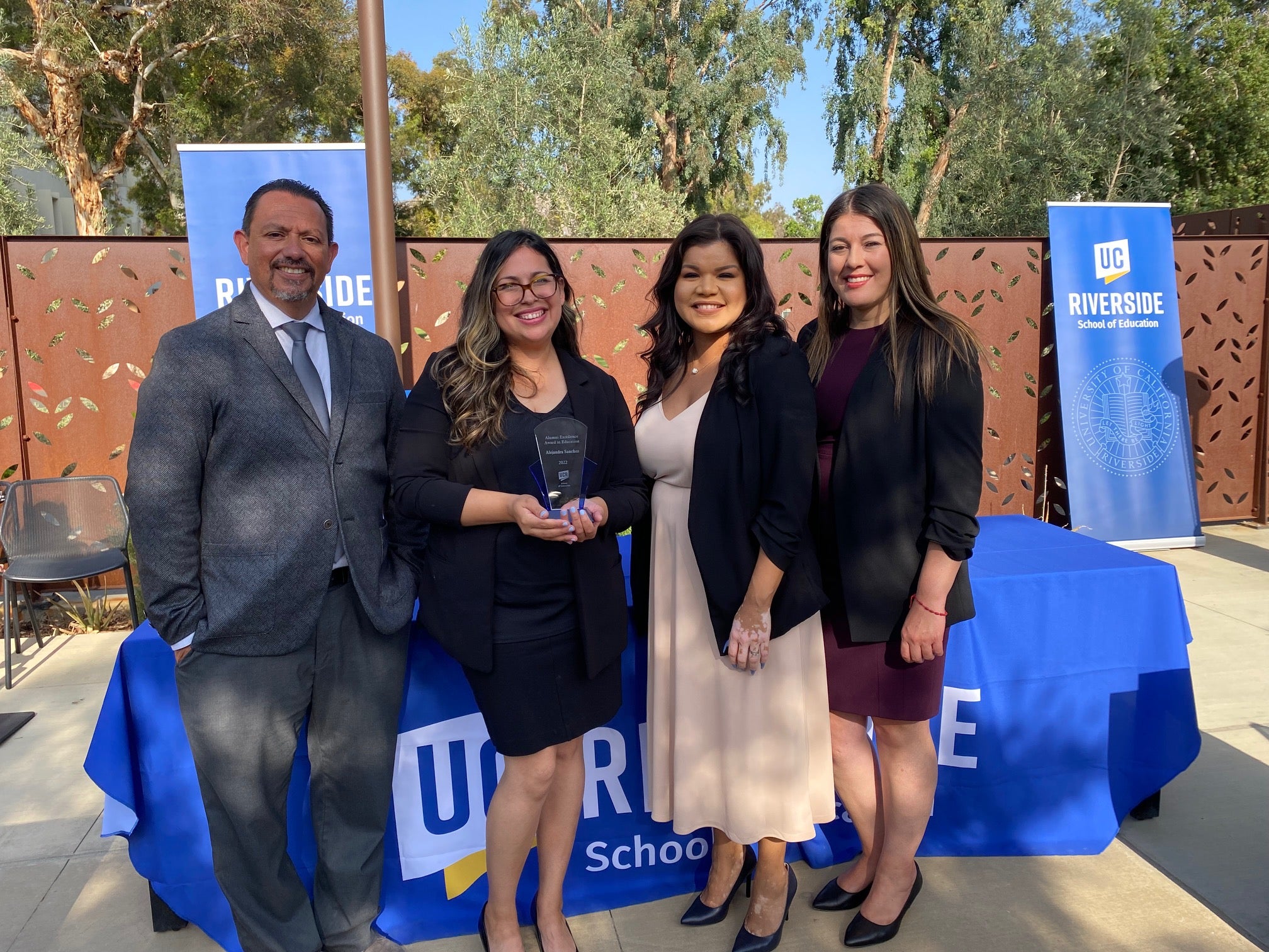 Alejandra with her award