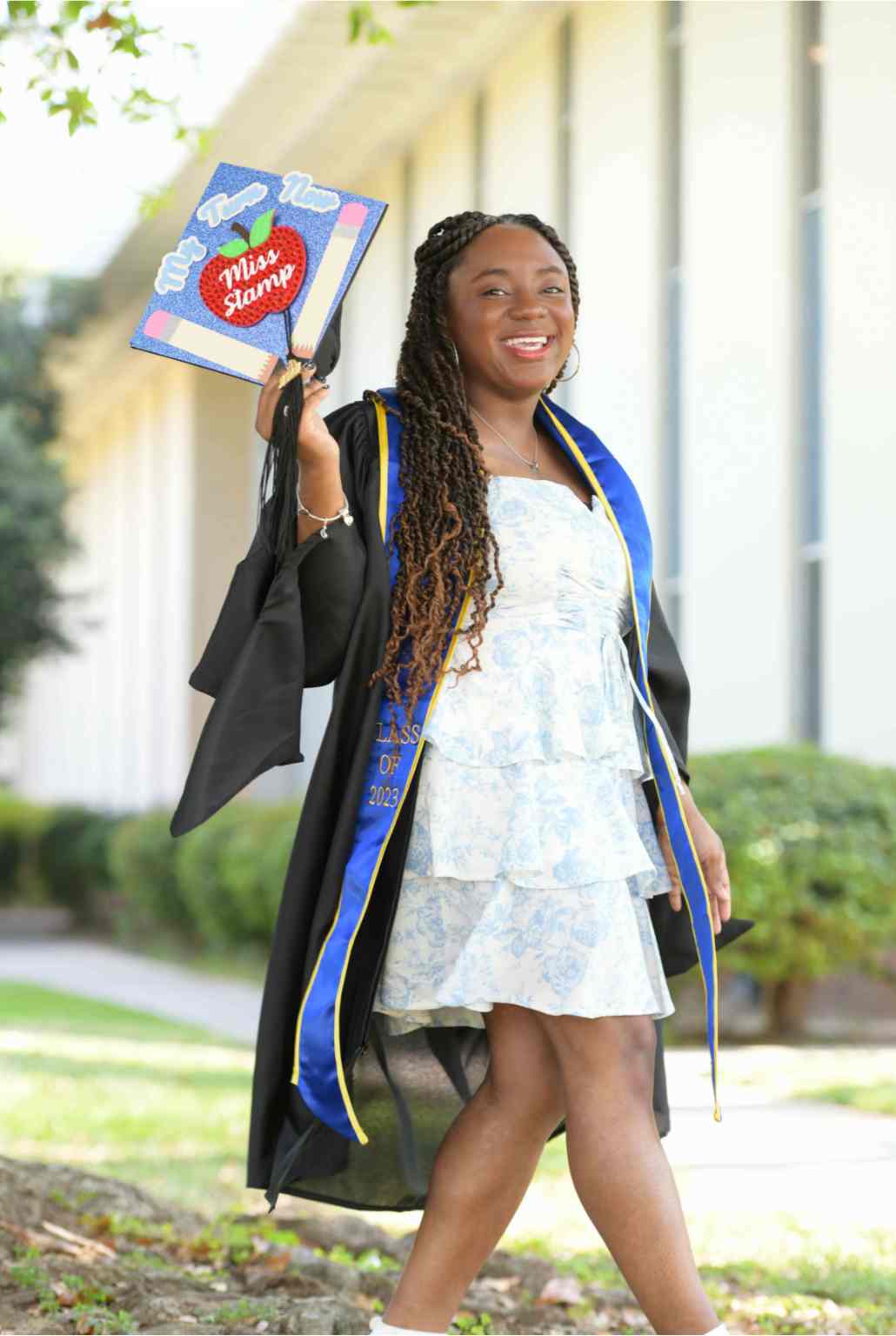 Graduating Teacher Credential Candidate in Cap and Gown