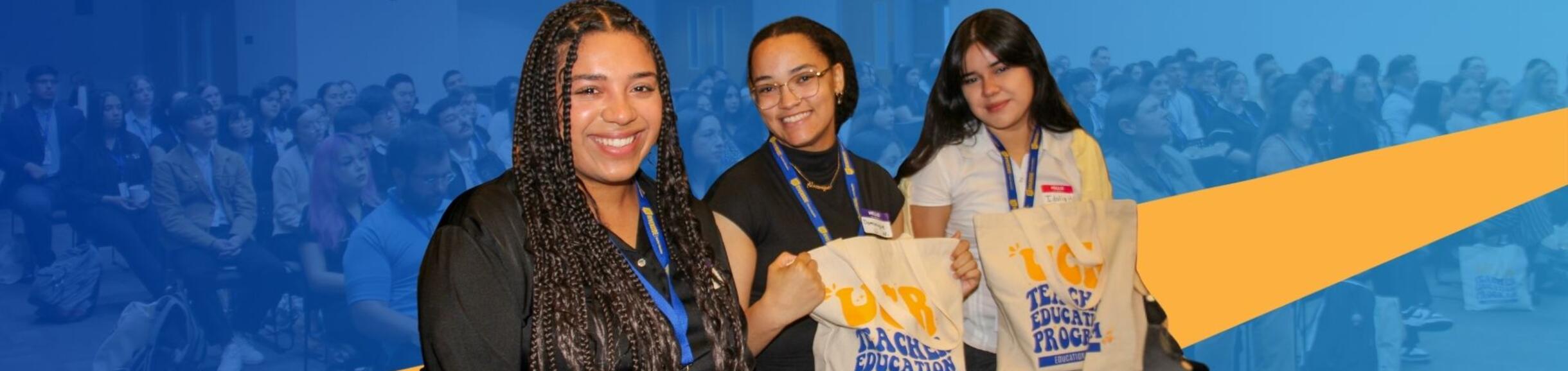 tep students holding tote bags