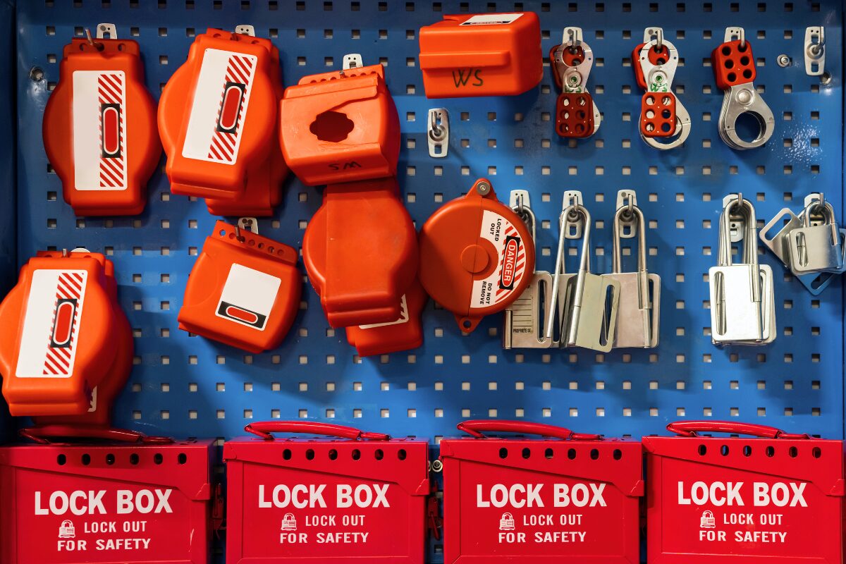 Peg board with LOTO locks and devices displayed