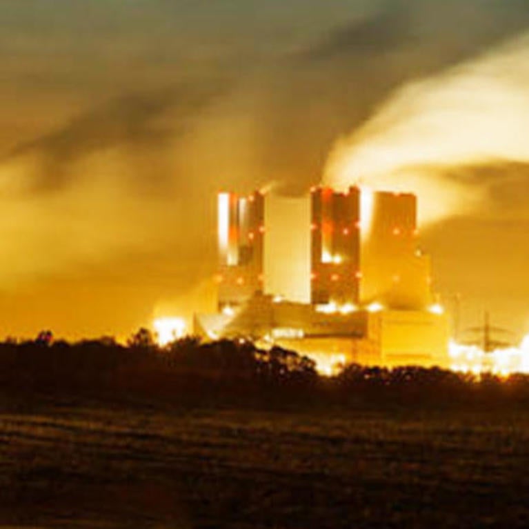 Smokestacks at sunset.