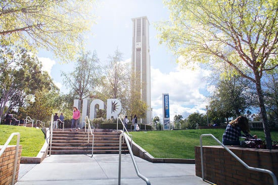 UCR letters in front of bell tower.