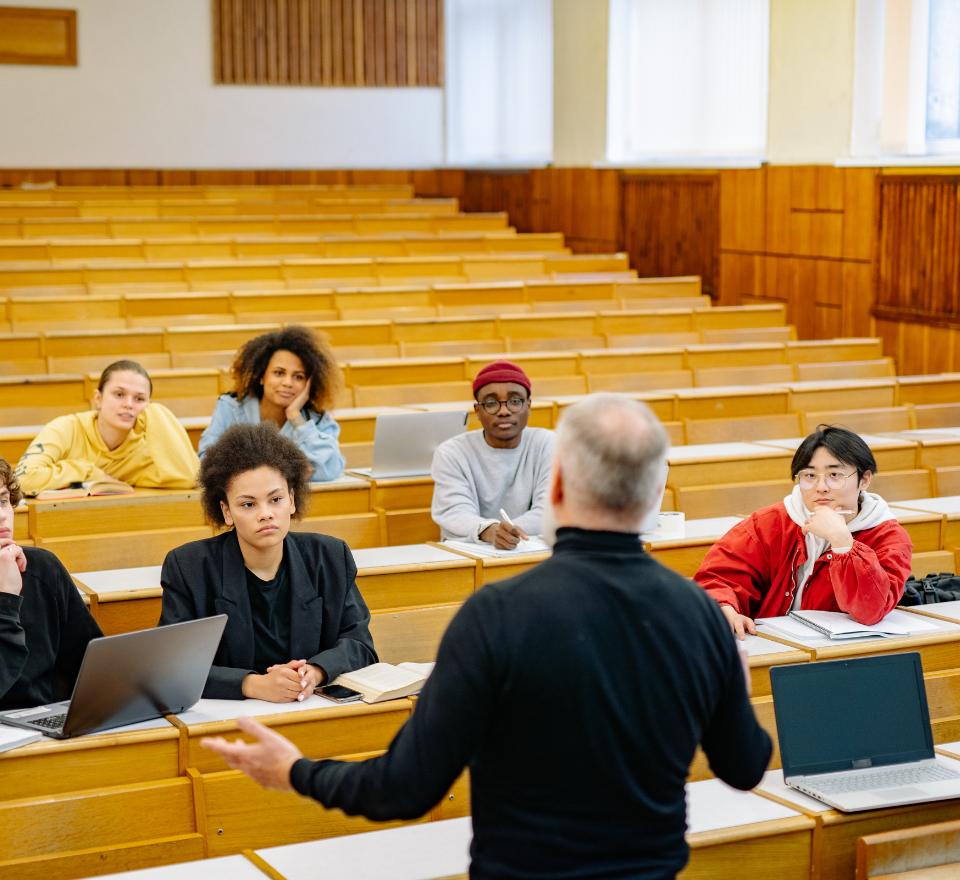 College classroom with instructor talking to students