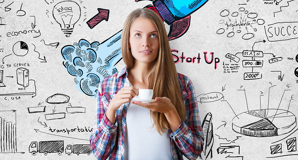 In front of a whiteboard with start up business drawing stands a White woman holding a cup of coffee and looking up