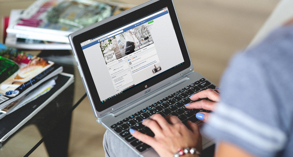 Business woman typing on laptop