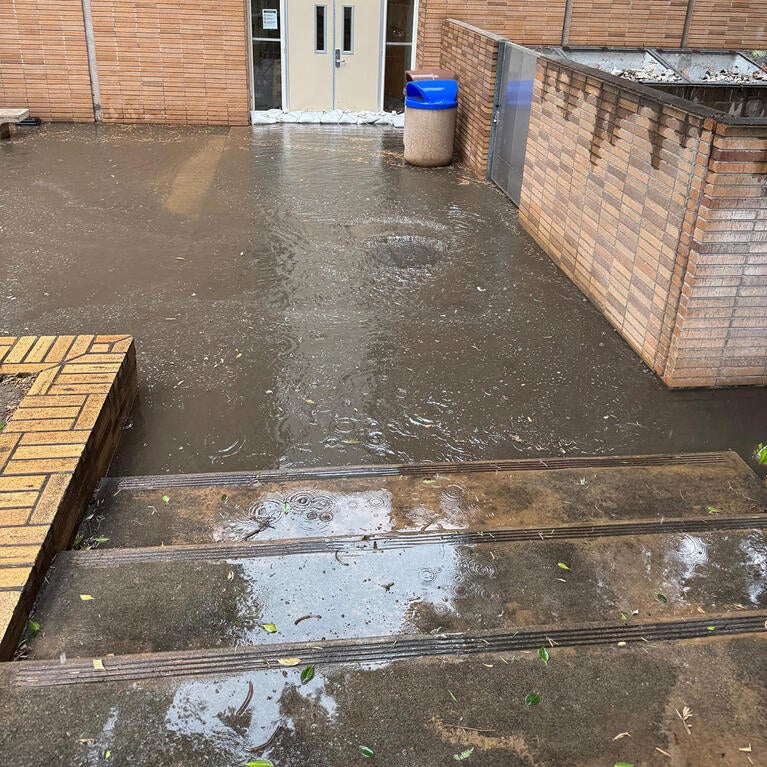 Water floods down steps