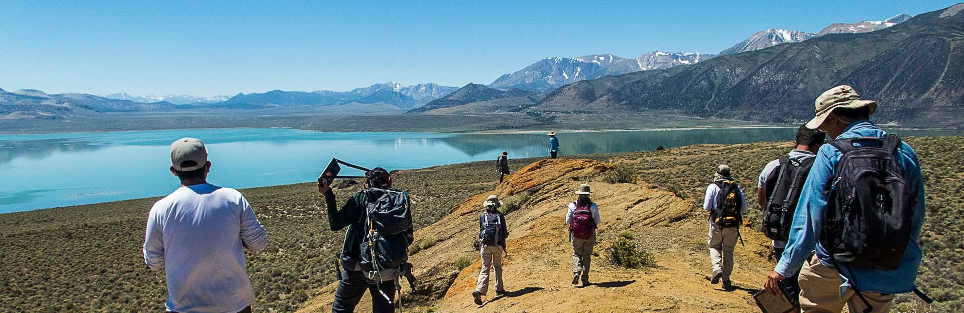 Field work at lake with mountains (c) Nicolas Barth