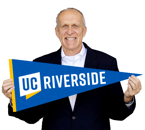University of California, Riverside Chancellor Kim Wilcox, holding a UCR pennant. University of California, Riverside Chancellor Kim Wilcox, holding a UCR pennant.