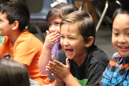group of young students laughing
