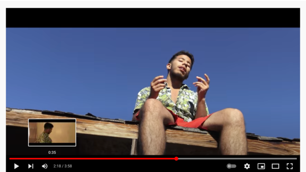 Gabriel E Bautista Smith sits on roof