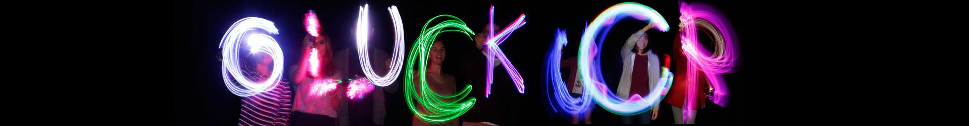 The words Gluck UCR painted with light