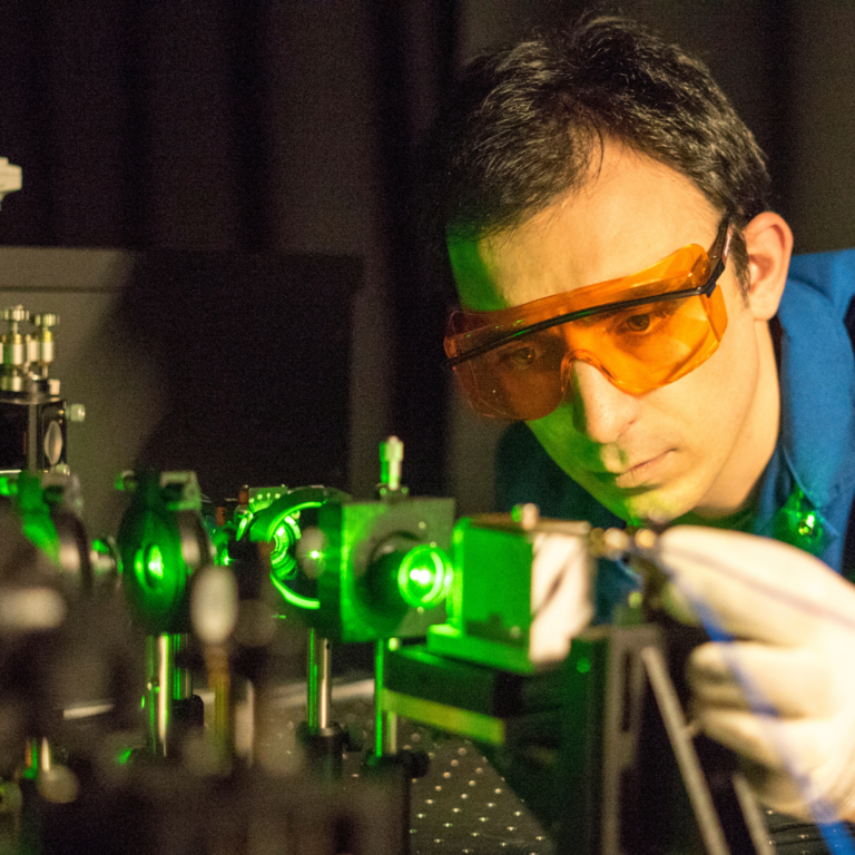 student adjusting experiment