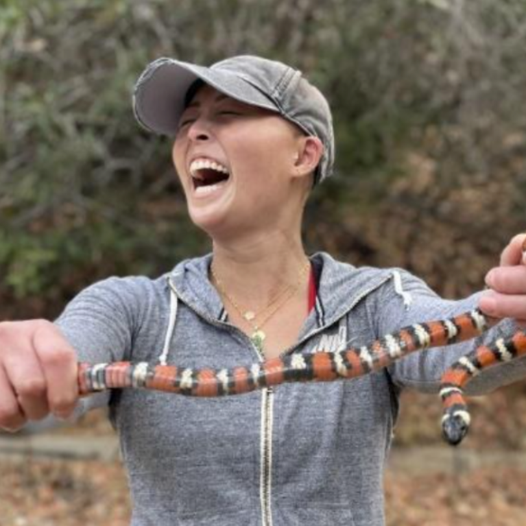 Picture of Allyn Nguyen holding a snake