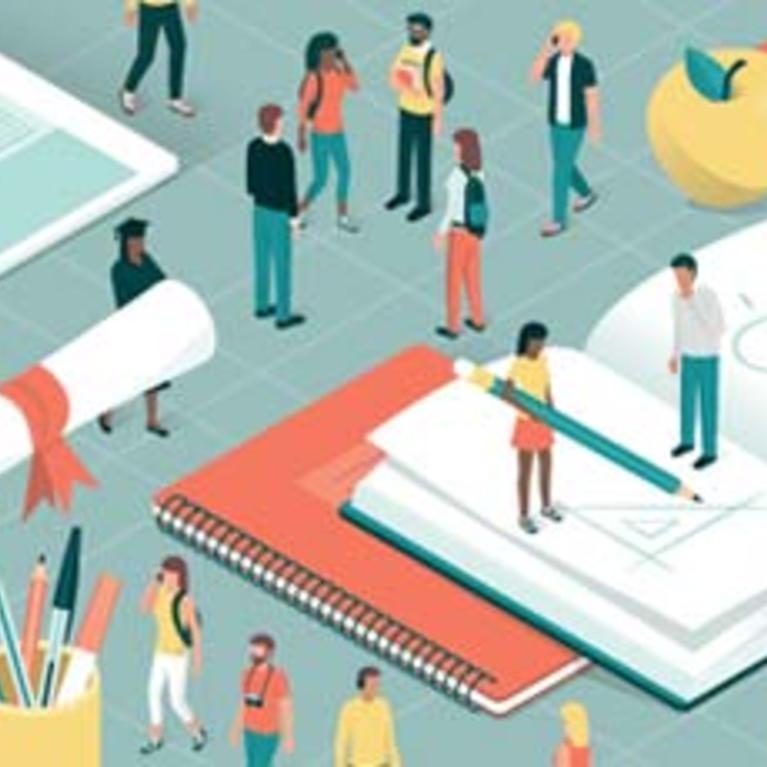 Students standing aroud life sized textbooks, pens, and paper