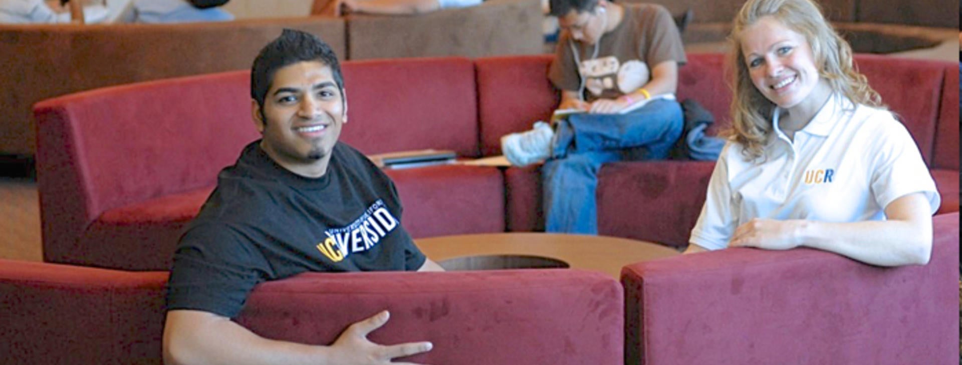 students on red couch