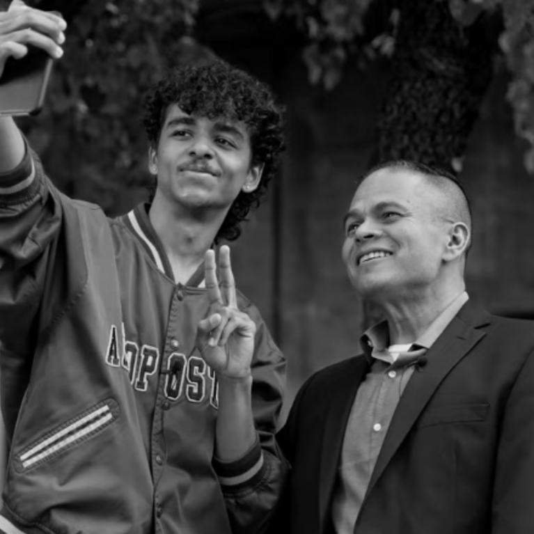 Michael Yosef Jimenez taking a selfie with Dr. Richard Rodriguez