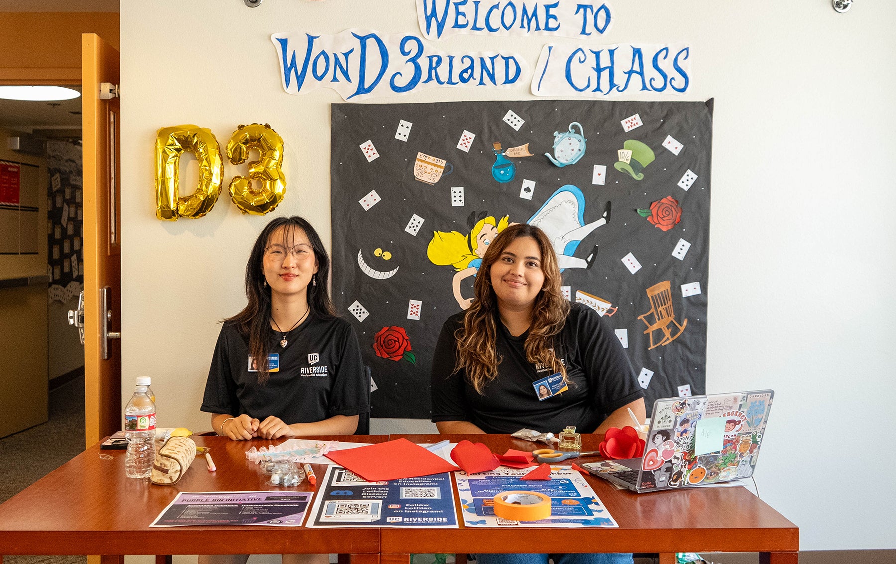 CHASS welcome desk with students