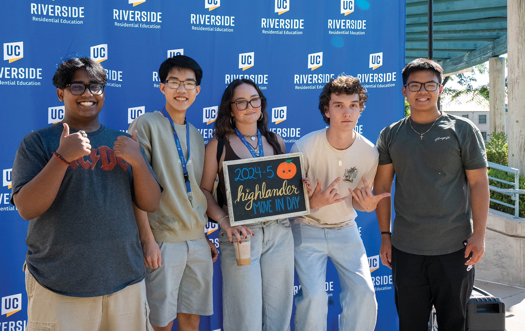 UCR students in front of banner on move-in day